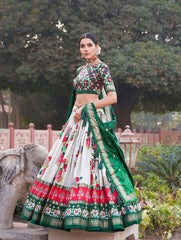 The artistry of Tussar silk and the mesmerizing allure of ikkat Patola prints with this exquisite lehenga choli