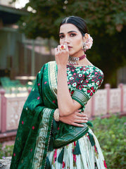 The artistry of Tussar silk and the mesmerizing allure of ikkat Patola prints with this exquisite lehenga choli
