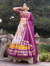 The artistry of Tussar silk and the mesmerizing allure of ikkat Patola prints with this exquisite lehenga choli