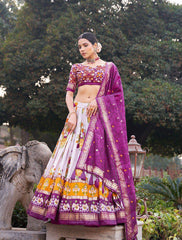 The artistry of Tussar silk and the mesmerizing allure of ikkat Patola prints with this exquisite lehenga choli